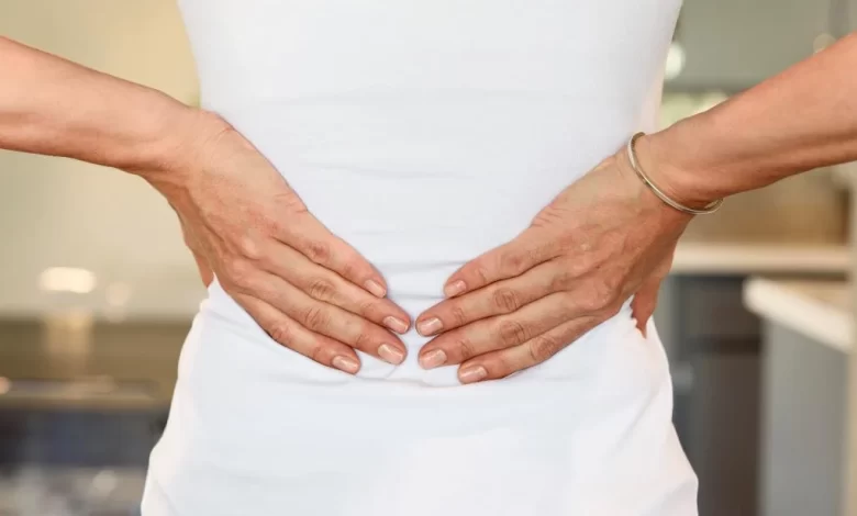 ألم الظهر قبل الدورة وأثناء نزولها